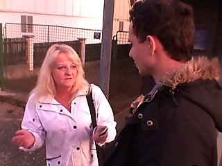 70 years senior skinny granny in stocking riding